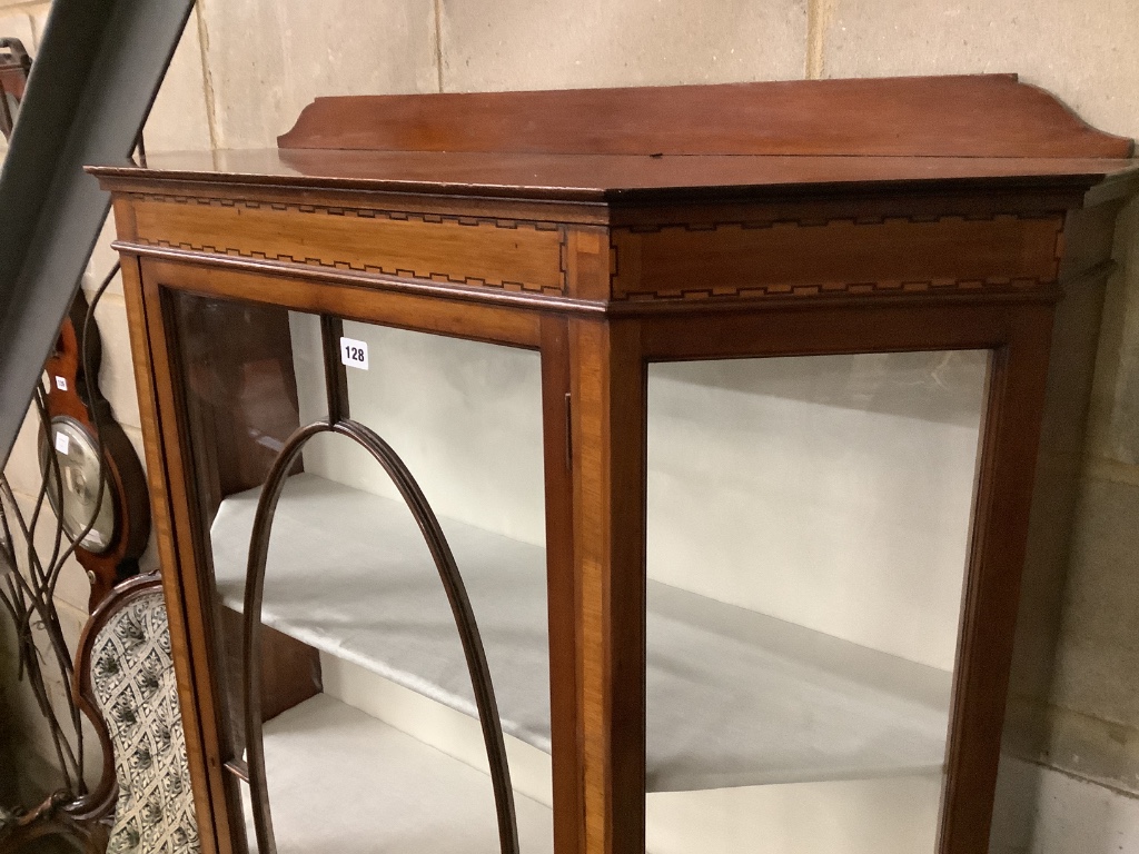 An Edwardian inlaid display cabinet fitted two shelves, width 103cm depth 37cm height 168cm